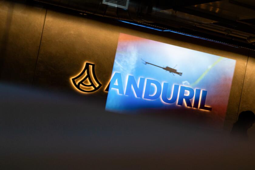 Signage at Anduril's headquarters in Costa Mesa, California, US, on Friday, Oct. 10, 2025. The supply chain for US defense manufacturing is too reliant on China, Anduril Industries Inc. founder Palmer Luckey said on Friday, shortly after new tariff threats by US President Donald Trump sent the markets skittering. Photographer: Kyle Grillot/Bloomberg via Getty Images