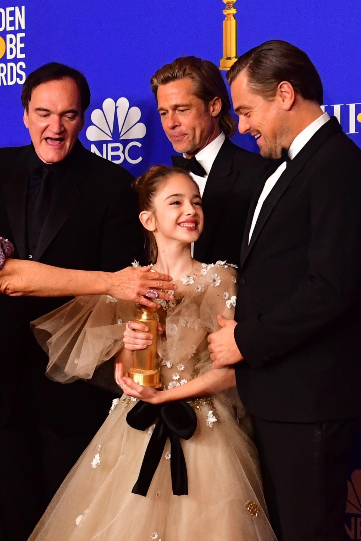 Quentin Tarantino, Brad Pitt, Leonardo DiCaprio, Julia Butters at the Golden Globes.