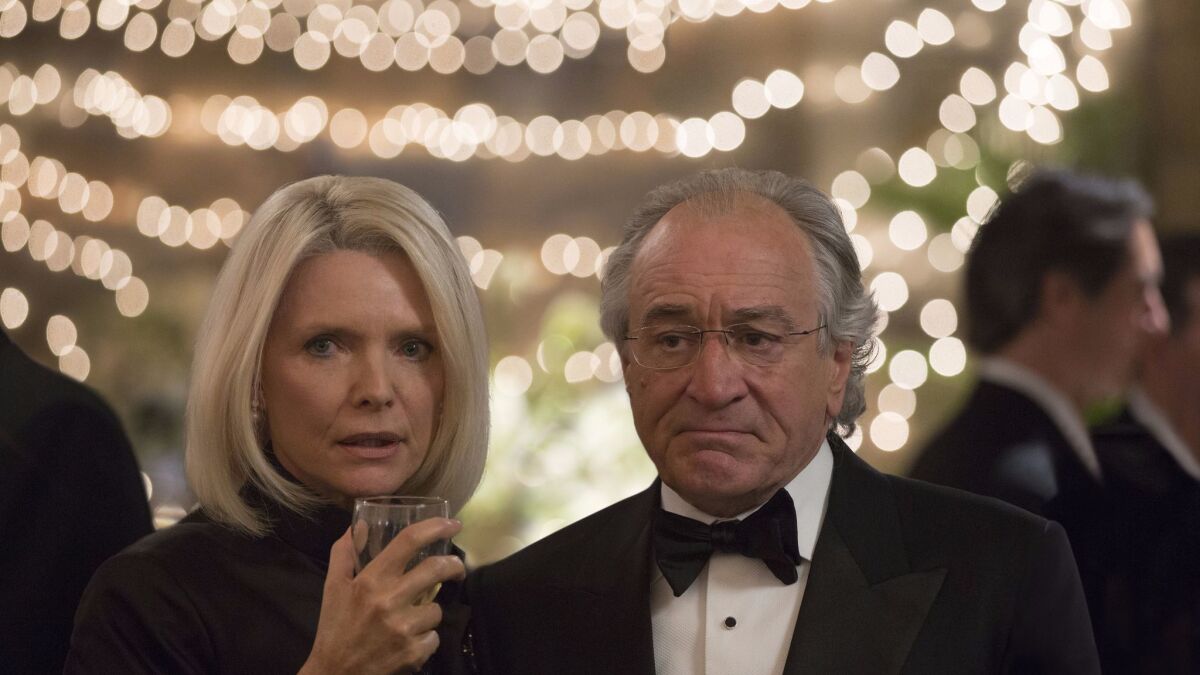 Michelle Pfeiffer as Ruth Madoff and Robert De Niro as Bernie Madoff in "The Wizard of Lies," premiering Saturday on HBO