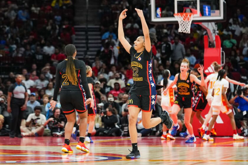 HOUSTON, TEXAS - MARCH 28: JuJu Watkins #12 of the West team celebrates after making a three point shot during the the 2023 McDonald's High School Girls All-American Game at Toyota Center on March 28, 2023 in Houston, Texas. (Photo by Alex Bierens de Haan/Getty Images)