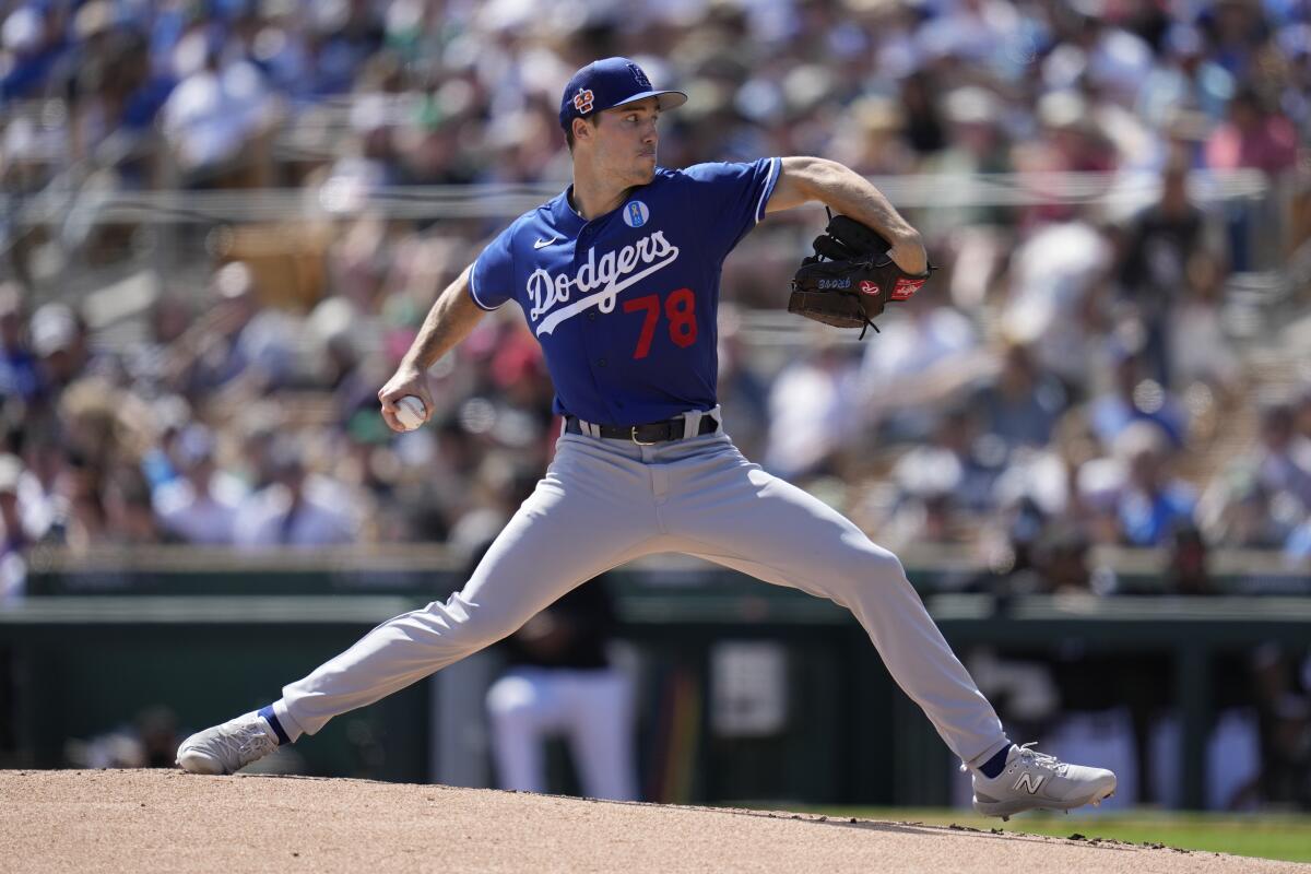 Dodgers pitcher Michael Grove throws during the first inning of a spring training game against the Chicago White Sox.