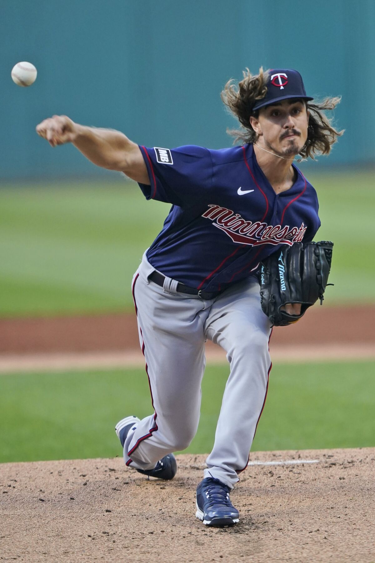Minnesota Twins starting pitcher Joe Ryan delivers during the first inning of the team's baseball game against the Cleveland Indians, Wednesday, Sept. 8, 2021, in Cleveland. (AP Photo/Tony Dejak)