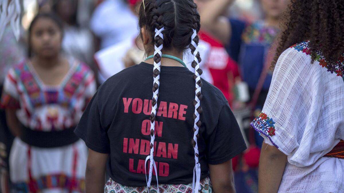 Dancers prepare to perform on Hollywood Boulevard during an event celebrating Indigenous Peoples Day on Oct. 8.