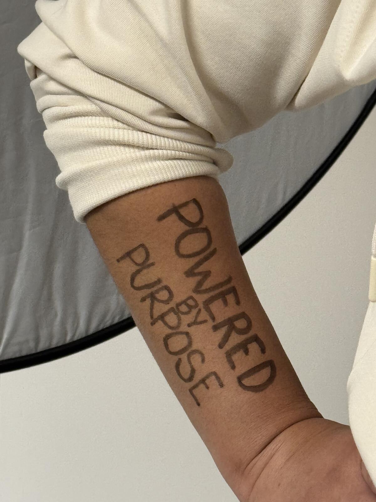 Pediatric Intensive Care Unit Nurse Nichole Johnson chose “Powered by Purpose” as her message.