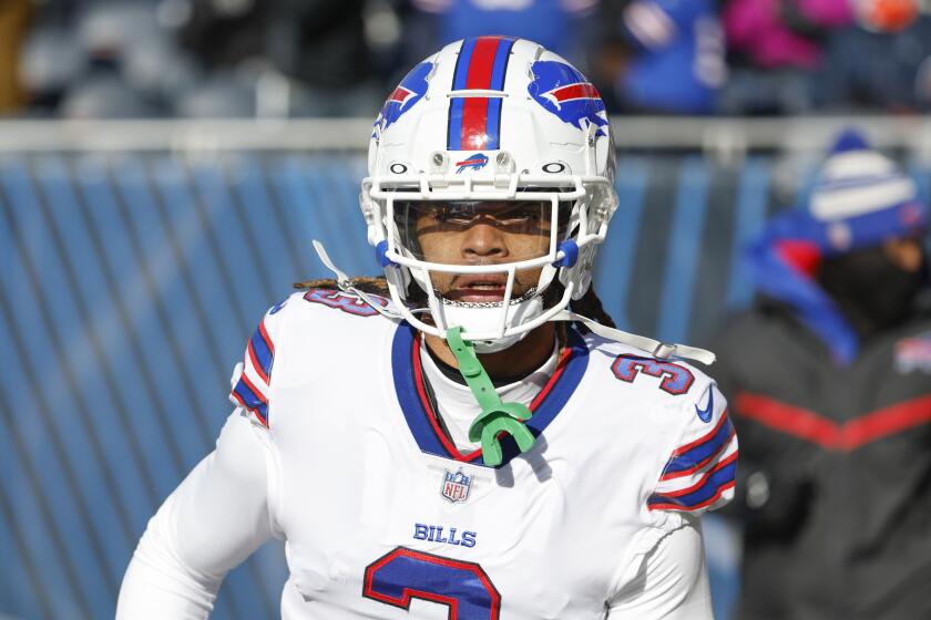 Buffalo Bills safety Damar Hamlin (3) arrives on the field before an NFL football game against the Chicago Bears