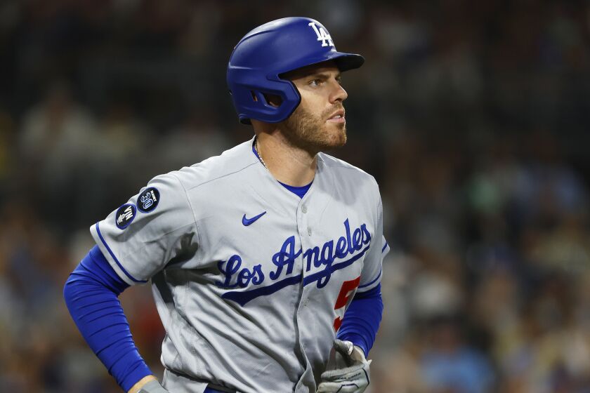 Dodgers' Freddie Freeman walks in the fourth inning against the San Diego Padres