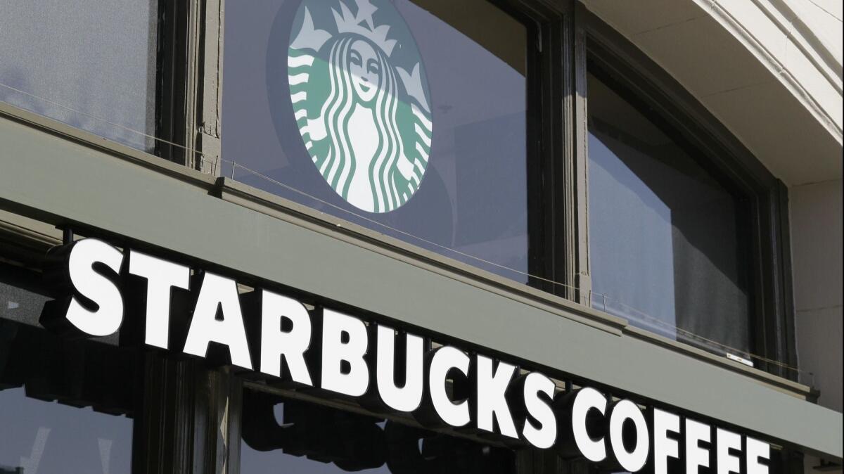 A Starbucks store in San Francisco is pictured. The company in planning organizational changes.