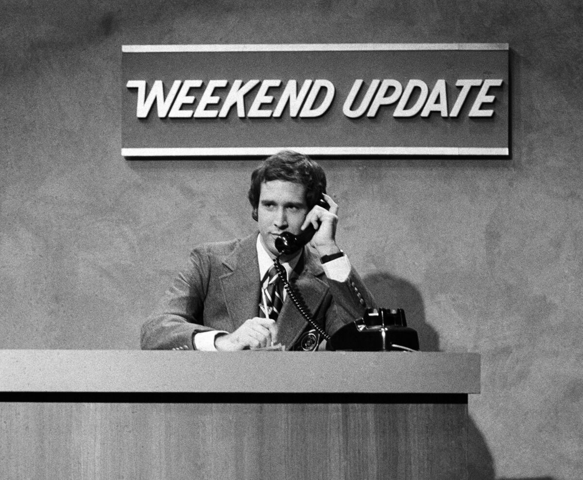 Chevy Chase performs during a "Weekend Update" sketch on "Saturday Night Live" in New York on Oct. 11, 1975, during the show's premiere.