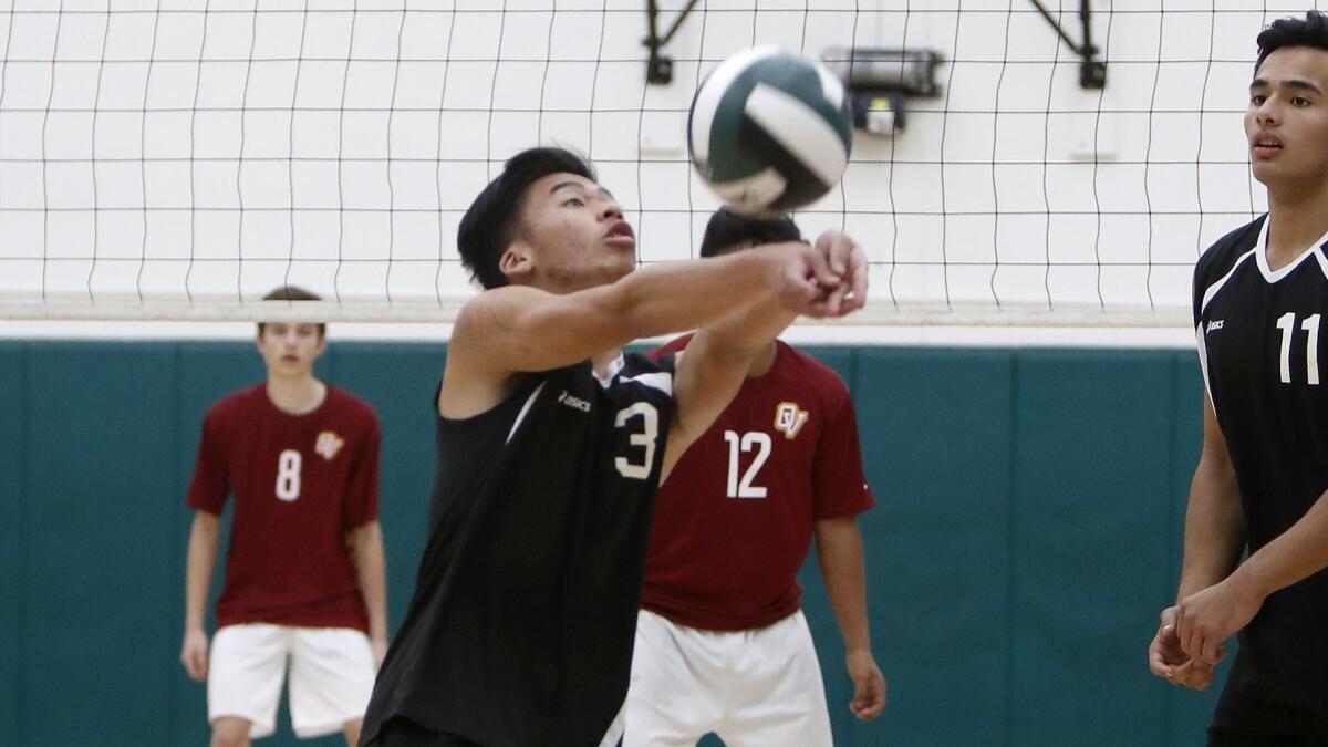 Christian Pham (3), shown keeping the ball alive on March 1, 2018, totaled 35 assists and 12 digs in Costa Mesa High's 22-25, 15-25, 25-19, 25-18, 15-11 victory over Saddleback on Thursday.