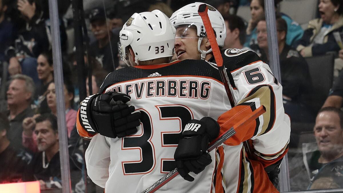 Ducks center Rickard Rakell celebrates with right wing Jakob Silfverberg after Rakell scored a goal against the San Jose Sharks during the second period Wednesday.