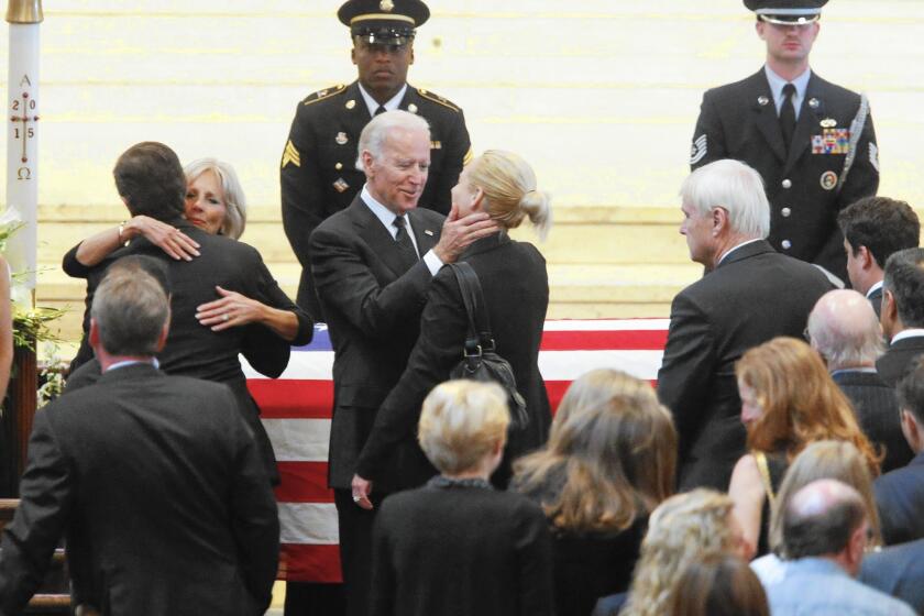 Vice President Joe Biden and his wife, Jill, greet mourners during the viewing for former Delaware Atty. Gen. Beau Biden at St. Anthony of Padua in Wilmington, Del.