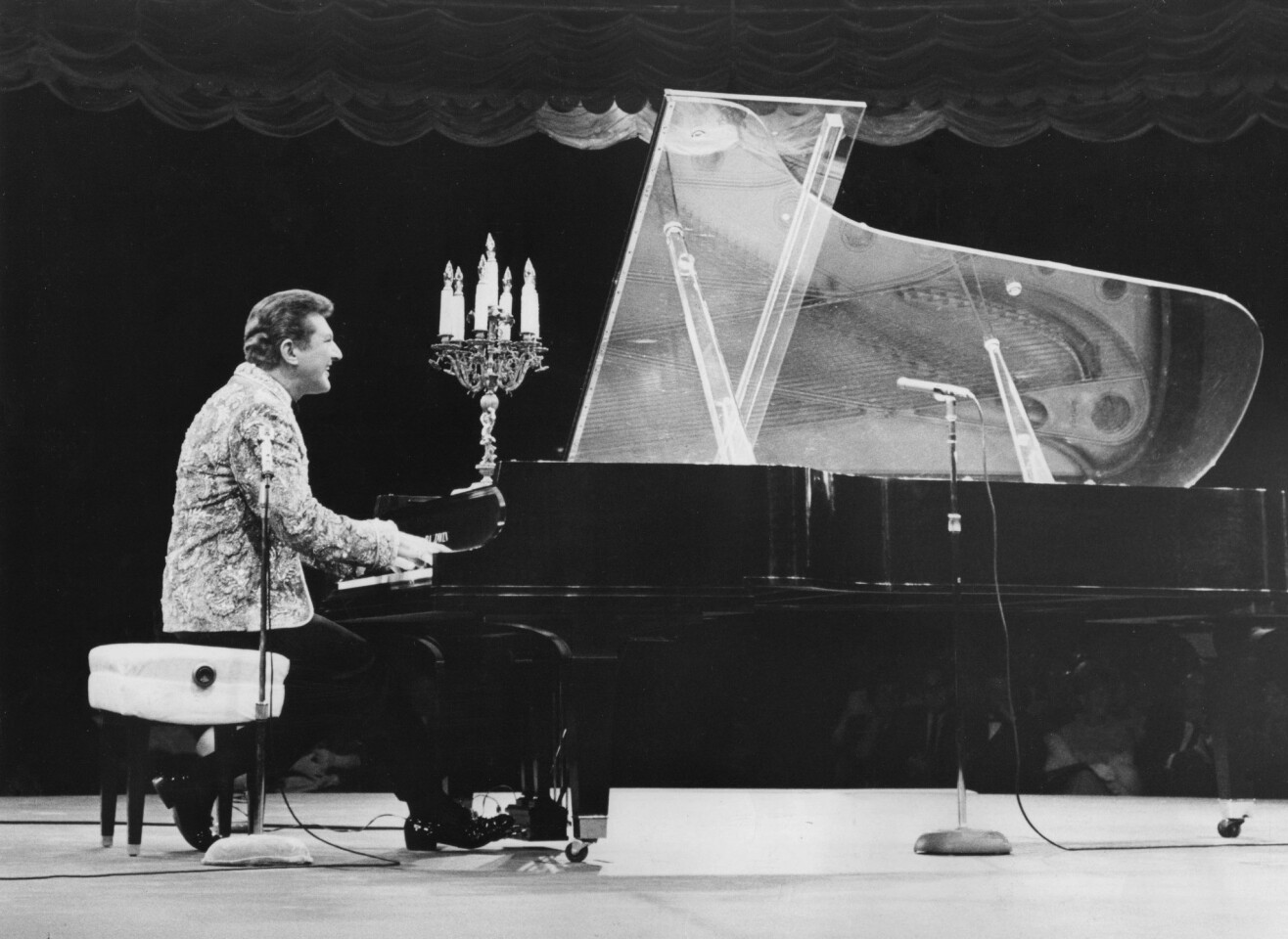 Liberace performs at the Carousel Theatre in West Covina in Aug. 31, 1965.