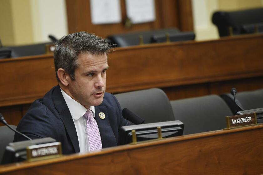 Rep. Adam Kinzinger, R-Ill., questions witnesses before a House Committee on Foreign Affairs hearing looking into the firing of State Department Inspector General Steven Linick, Wednesday, Sept. 16, 2020 on Capitol Hill in Washington. (Kevin Dietsch/Pool via AP)
