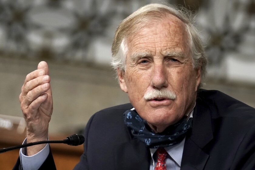 FILE - In this May 6, 2020 file photo, Sen. Angus King, I-Maine, asks questions during the Senate Armed Services Committee hearing on the Department of Defense Spectrum Policy and the Impact of the Federal Communications Commission's Ligado Decision on National Security during the COVID-19 coronavirus pandemic on Capitol Hill in Washington. A Senate bill that seeks to speed up philanthropic donations to charities appears to be gaining bipartisan support in Congress, taking aim at a popular charitable vehicle called donor-advised funds. DAFs allow donors to enjoy immediate tax deductions while investing their contributions tax-free. The bill, introduced by Sens. King and Chuck Grassley, an Iowa Republican, would make numerous reforms to DAFs by creating new categories of accounts, among other changes. (Greg Nash/Pool via AP)