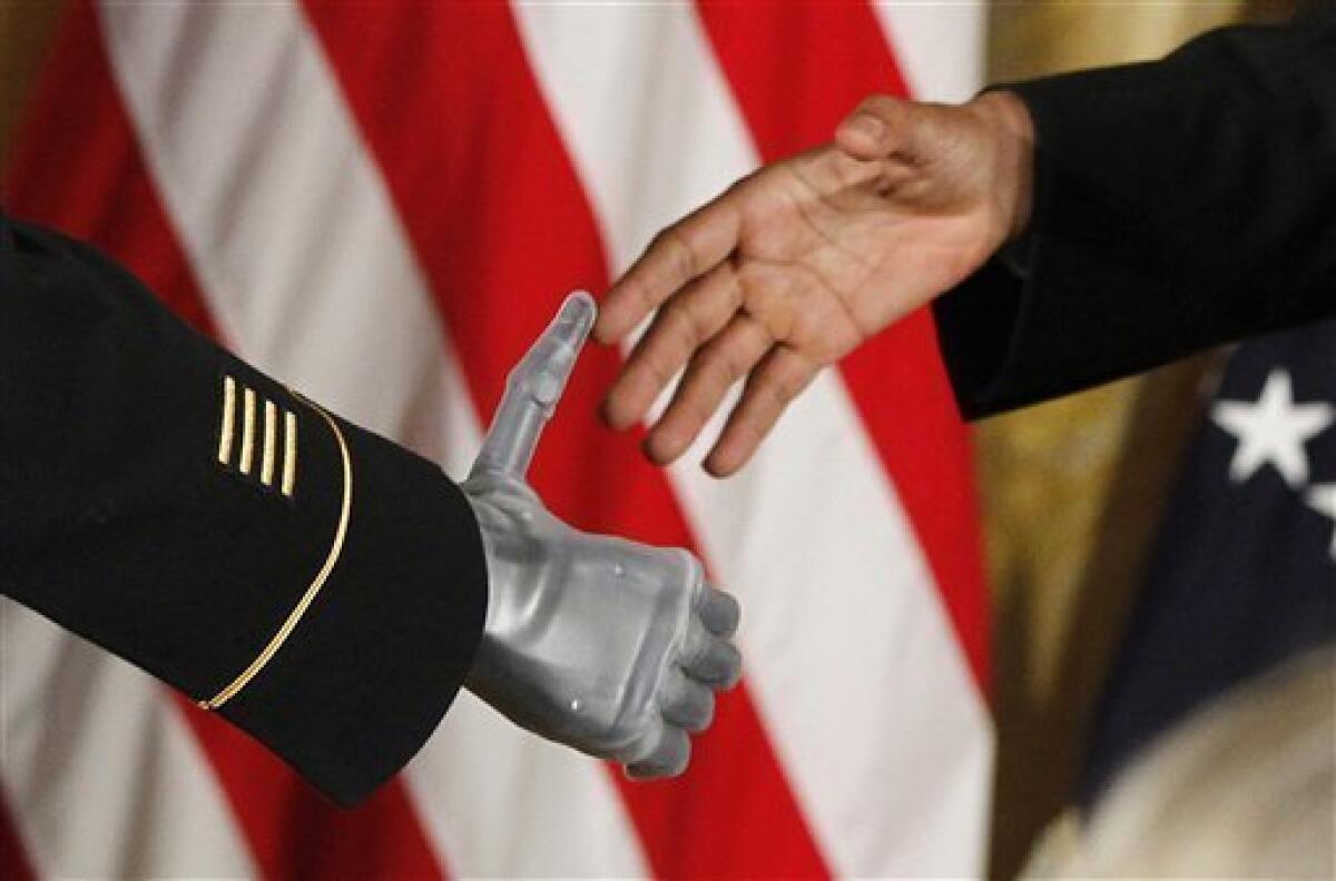 Sergeant First Class Leroy Arthur Petry, U.S. Army, waits to receive his  Medal of Honor from U.S. President Barack Obama for his heroic actions in  Afghanistan in May, 2008, during a ceremony