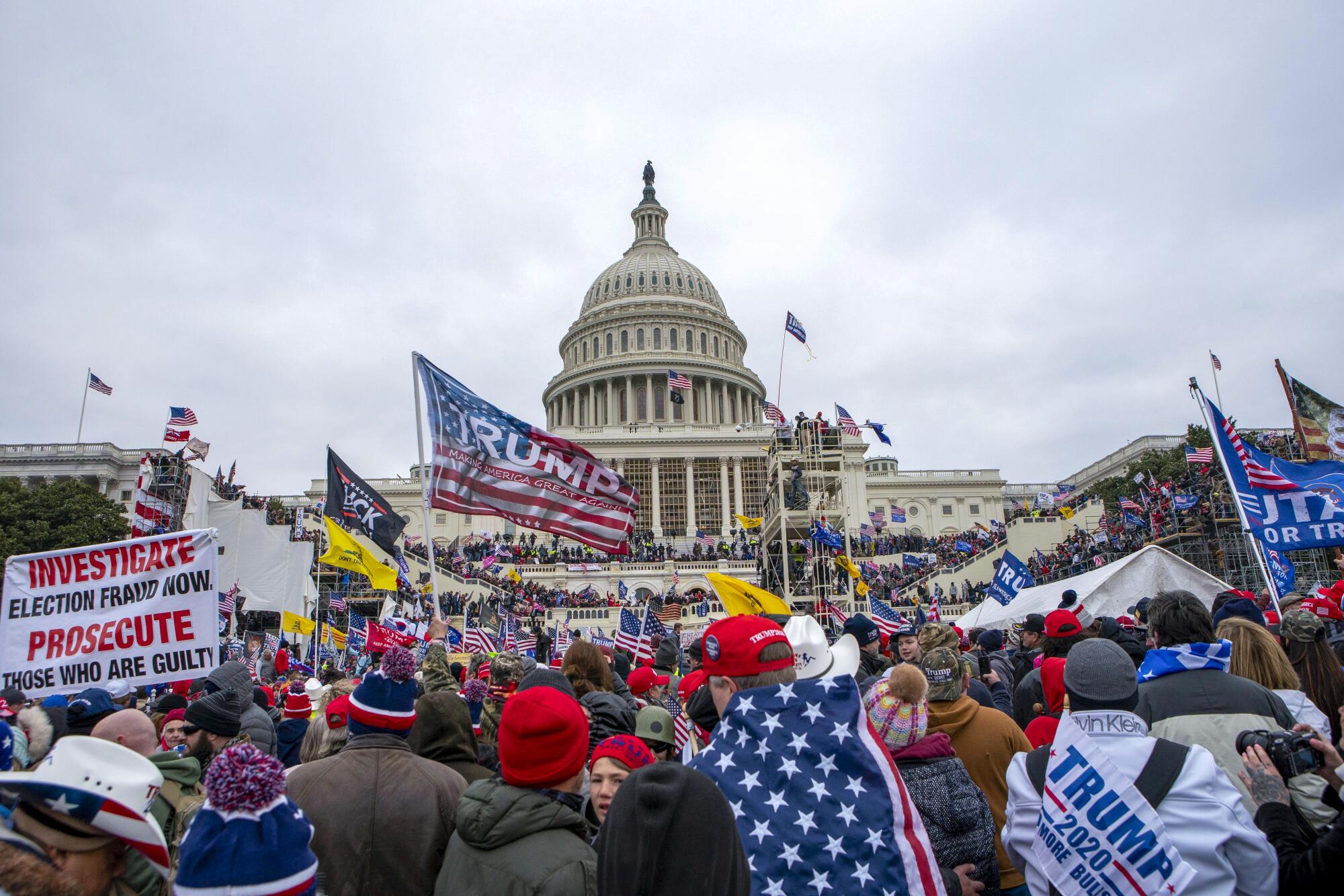 Rioters loyal to President Donald Trump rally at the U.S. Capitol in Washington, Jan. 6, 2021.
