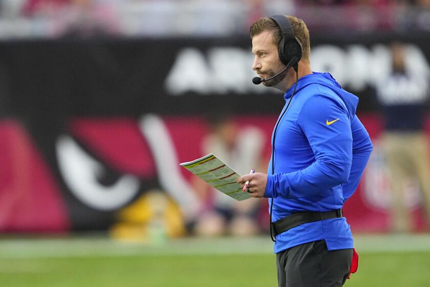 Rams coach Sean McVay watches action against the Cardinals from the sideline.