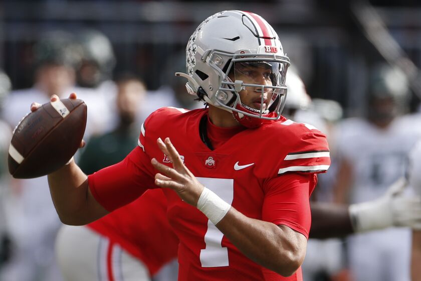 Ohio State quarterback C.J. Stroud drops back to pass against Michigan State during the first half.