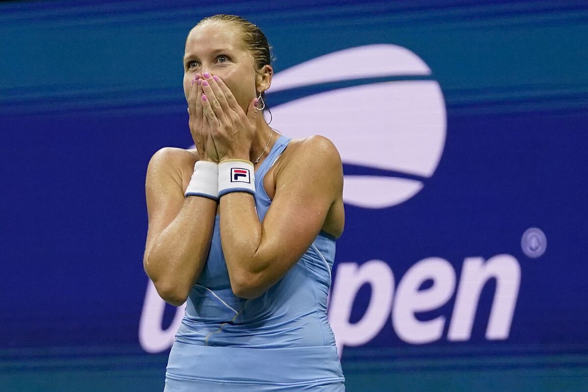 Shelby Rogers reacts after defeating Ashleigh Barty during the third round of the U.S. Open.