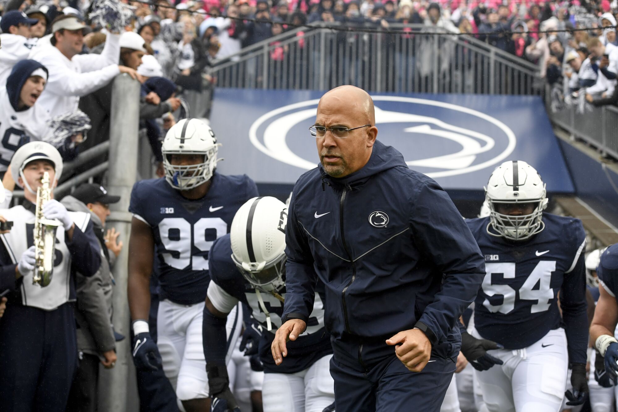 Penn State coach James Franklin leads his team onto the field against Illinois Saturday