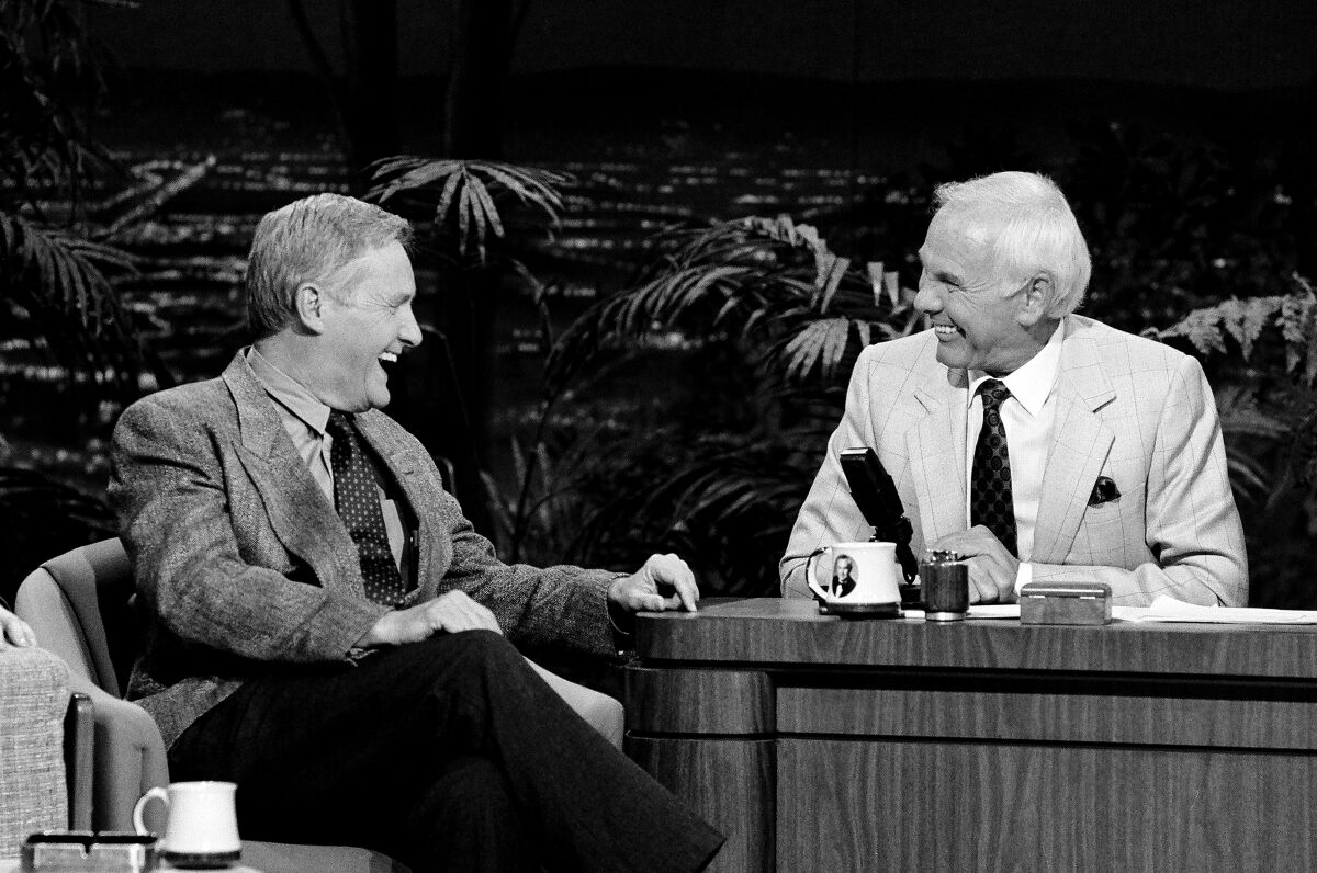 Orson Bean, left, speaks with host Johnny Carson on "The Tonight Show" on May 2, 1991.