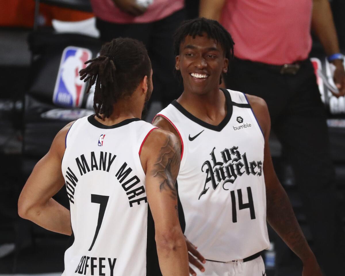 The Clippers' Amir Coffey and Terance Mann, pictured Wednesday, both had big games in Friday's overtime win.