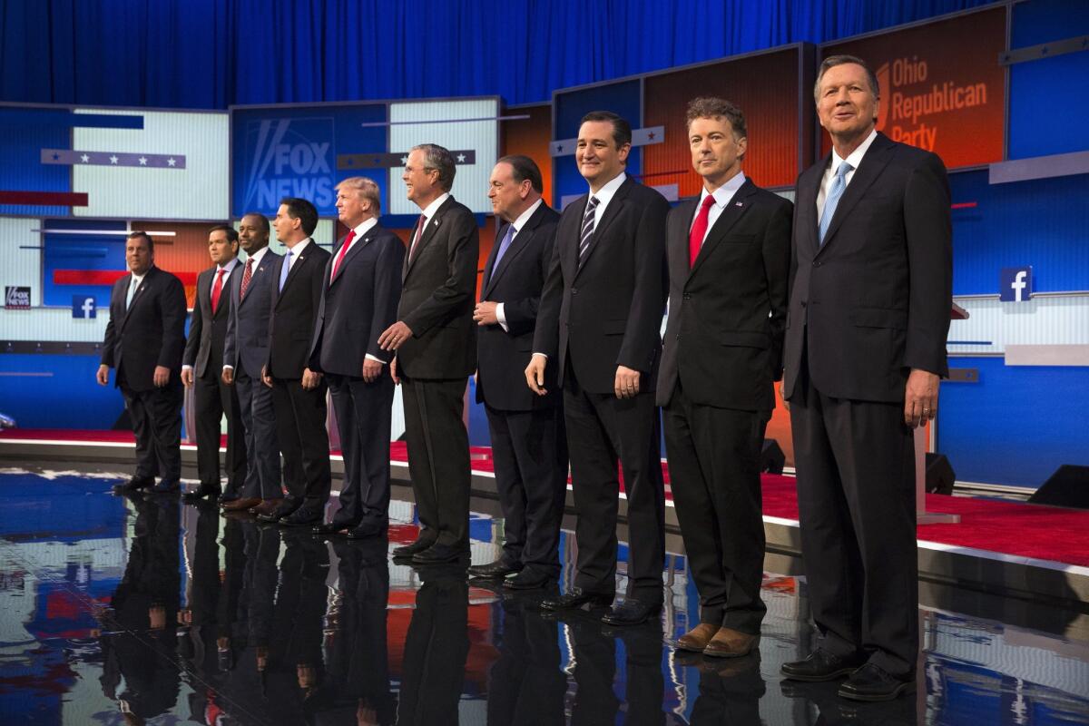 Republican presidential candidates from left, Chris Christie, Marco Rubio, Ben Carson, Scott Walker, Donald Trump, Jeb Bush, Mike Huckabee, Ted Cruz, Rand Paul, and John Kasich take the stage for the first Republican presidential debate at the Quicken Loans Arena Thursday, Aug. 6, 2015, in Cleveland. Republicans are steeling themselves for a long period of deep uncertainty following a raucous first debate of the 2016 campaign for president, with no signs this past week’s Fox News face-off will winnow their wide-open field of White House hopefuls anytime soon. (AP Photo/John Minchillo)