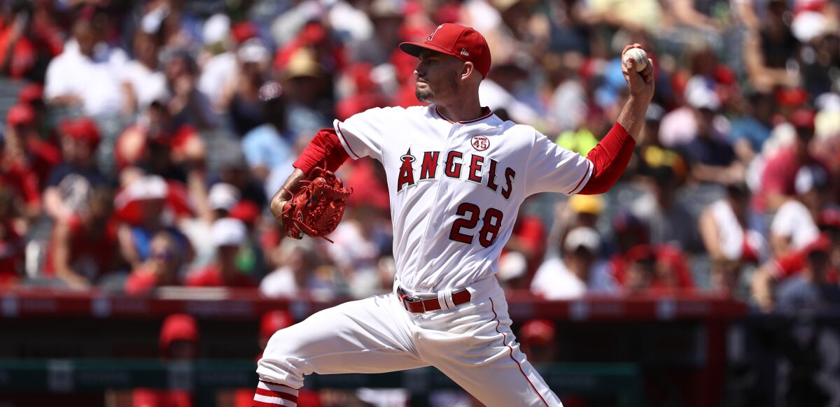 Angels starter Andrew Heaney delivers during the first inning against the Boston Red Sox on Sunday.