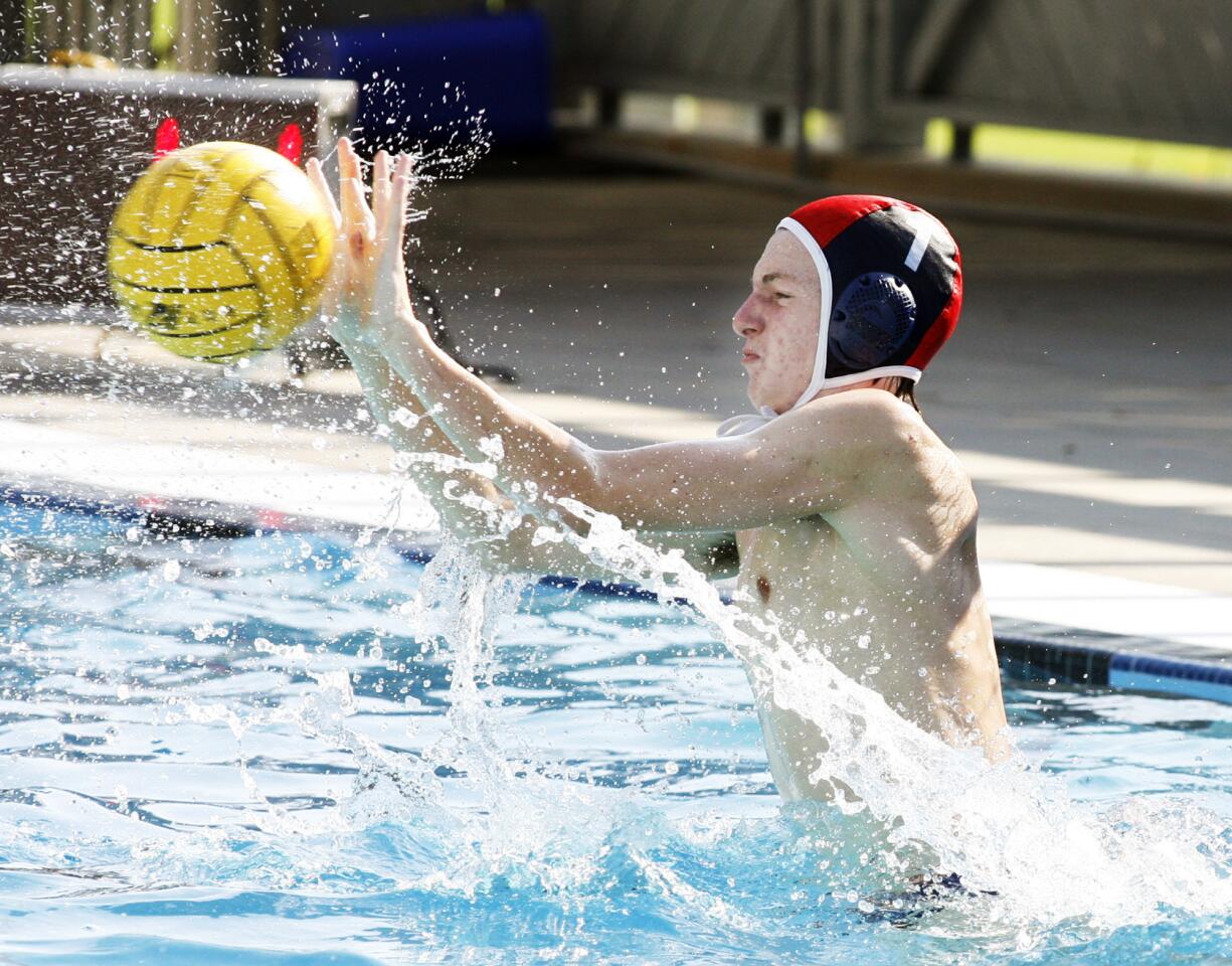 Pasadena Poly keeper Josh Ball stops a hard Pasadena shot.