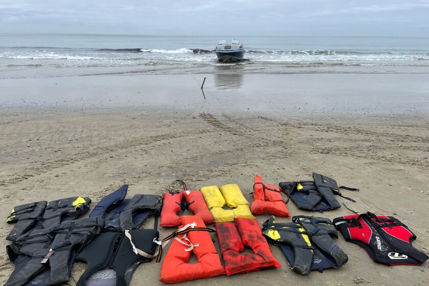 People who jumped off this boat that was abandoned in La Jolla on Nov. 30 left behind a dozen life jackets.