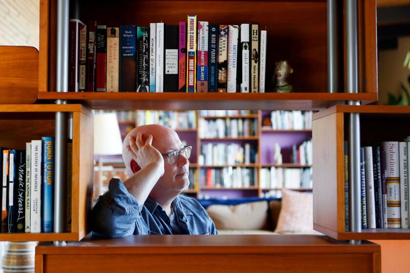 LOS ANGELES, CA MAY 8, 2017: Portrait of author Mark Haskell Smith, in his home in Los Angeles, CA May 8, 2017. He has written an essay for the book section about cleaning out his house, Marie Kondo-style, which included getting rid of 500 books. (He still has hundreds, though.) (Francine Orr/ Los Angeles Times)