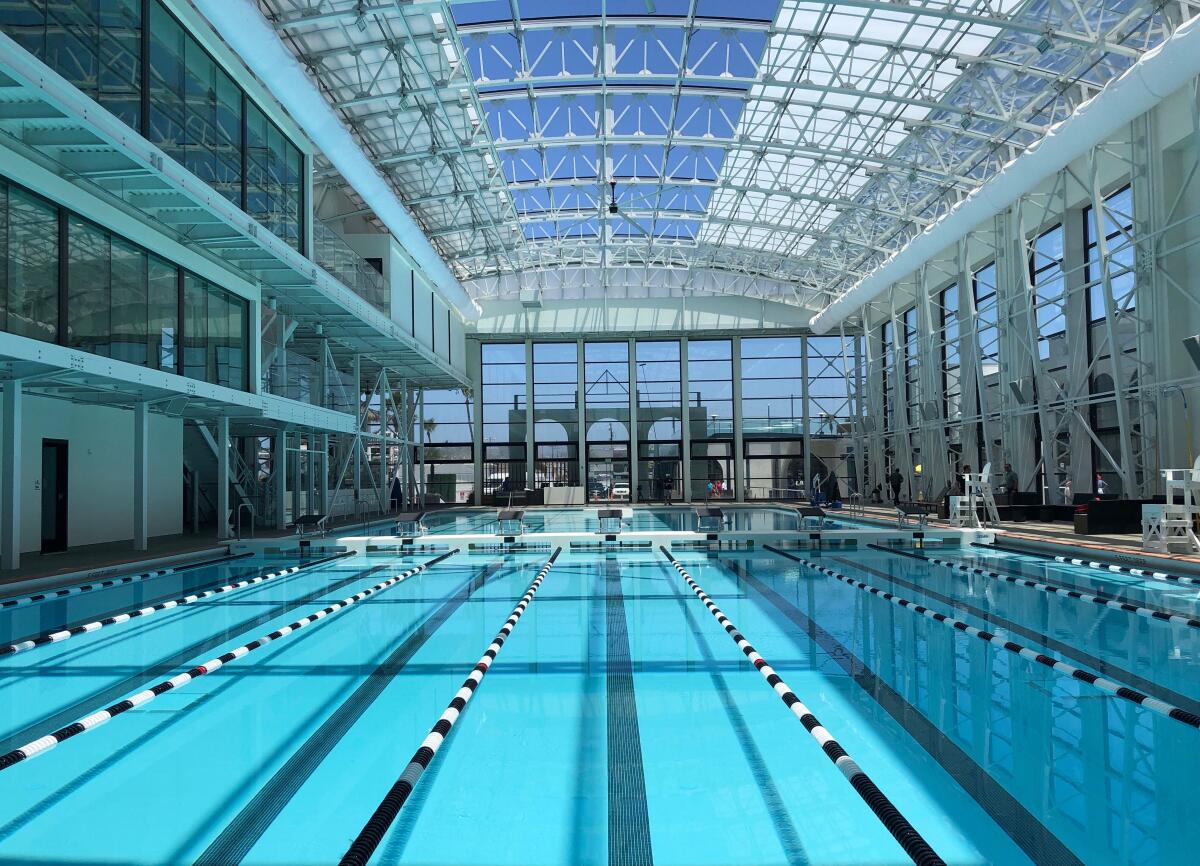 Revamped Plunge pool in Mission Beach is housed within a new Belmont Park building that features a retractable roof.