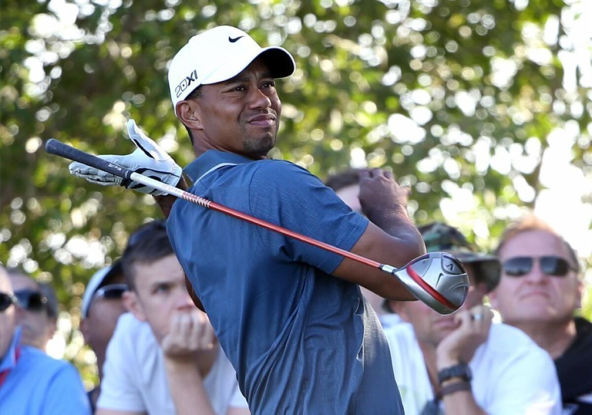 Tiger Woods competes in Abu Dhabi last week.