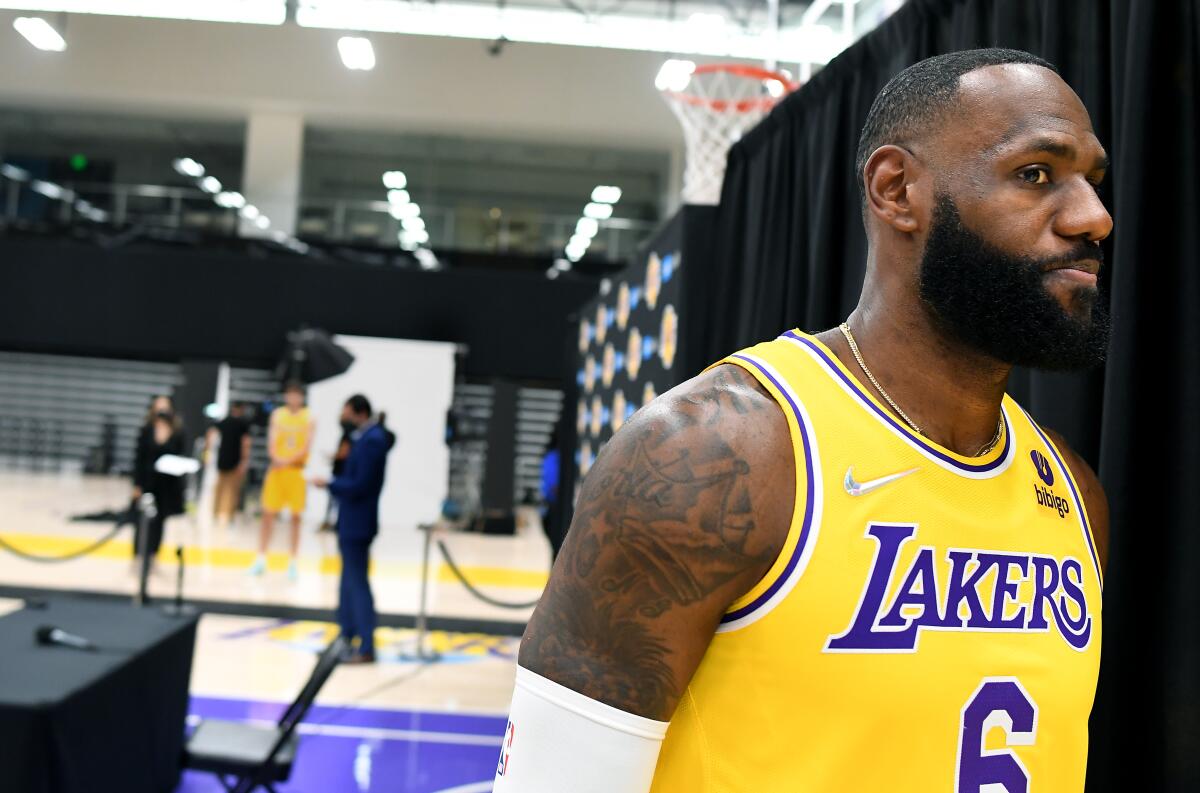 Lakers star LeBron James finishes an interview during media day.