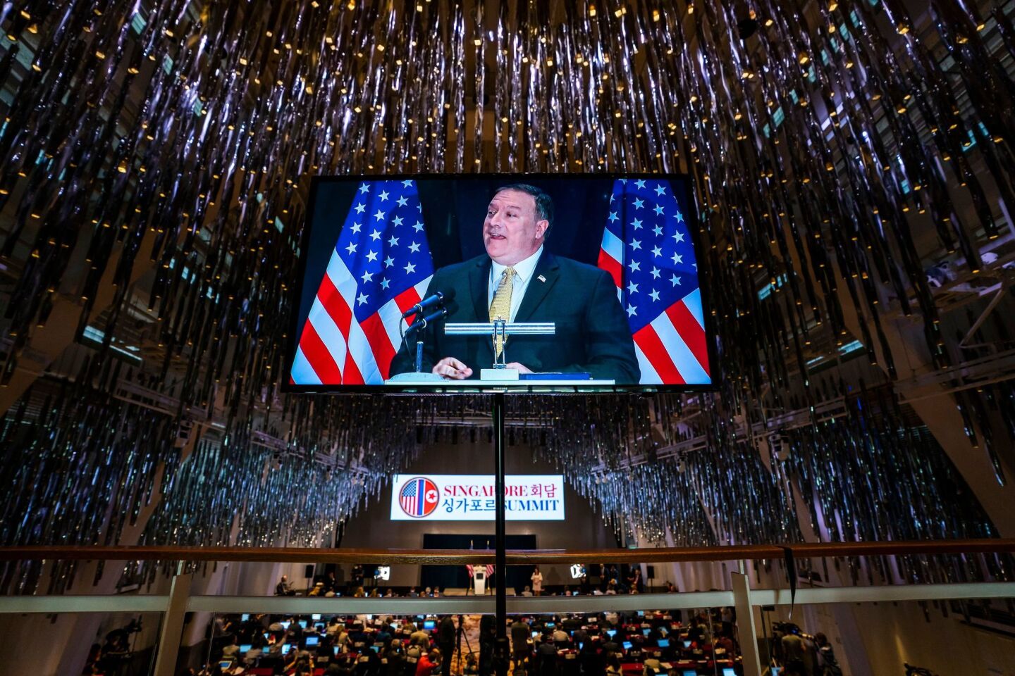 Secretary of State Mike Pompeo is seen in a television monitor as he speaks to the media about the upcoming meeting between U.S. President Donald J. Trump and North Korean leader Kim Jong Un in the J.W. Marriott in Singapore on Monday, June 11, 2018.