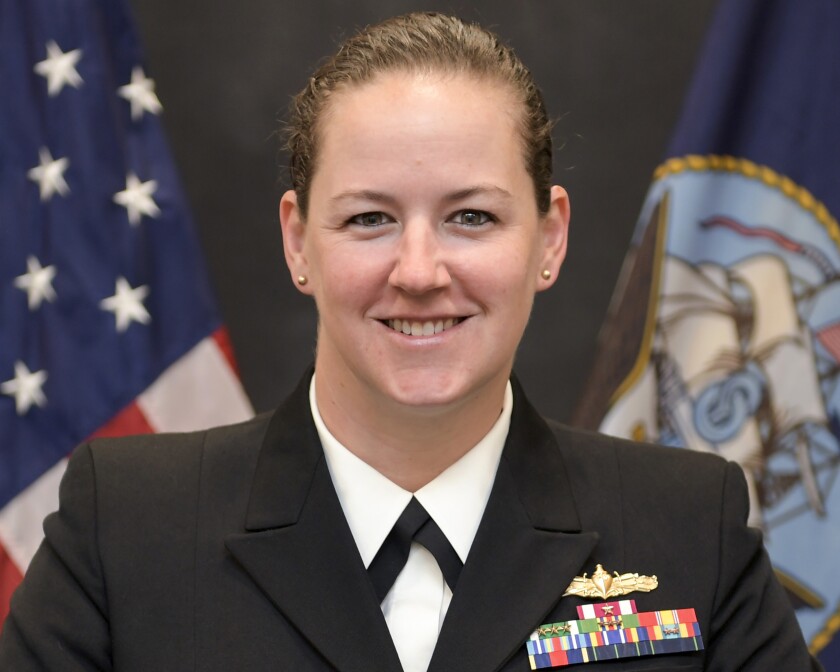This undated photo released by the U.S. Navy shows U.S. Navy Cmdr. Billie J. Farrell. Farrell is scheduled to become the first woman to lead the crew of the USS Constitution, the 224-year-old warship known as Old Ironsides, during a change-of-command ceremony scheduled for Friday, Jan. 21, 2022. Farrell takes over from Cmdr. John Benda, who has led the ship's crew since February of 2020. (U.S. Navy via AP)