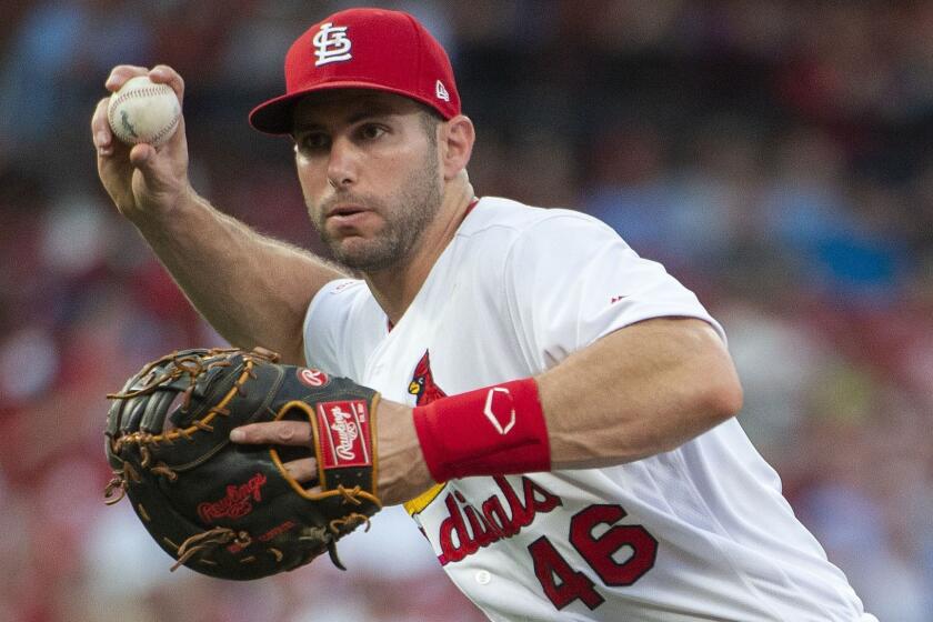 St. Louis Cardinals first baseman Paul Goldschmidt throws the ball to first in a baseball game against the Miami Marlins, Tuesday, June 18, 2019, in St. Louis. (AP Photo/L.G. Patterson)