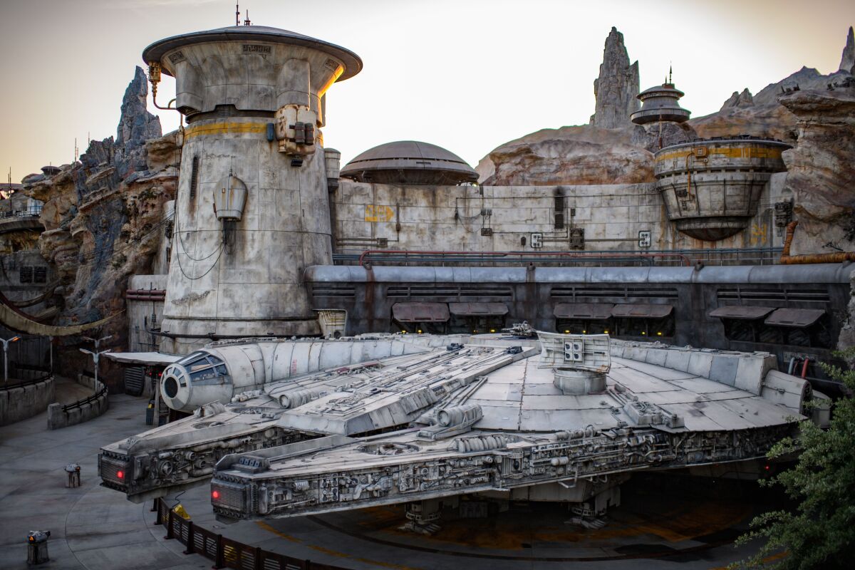 A 100-foot model of the Millenium Falcon smuggling ship sits near the entrance to the ride Millenium Falcon: Smuggler's Run in Star Wars: Galaxy's Edge, the 14-acre land opening Friday at Disneyland Park in Anaheim.