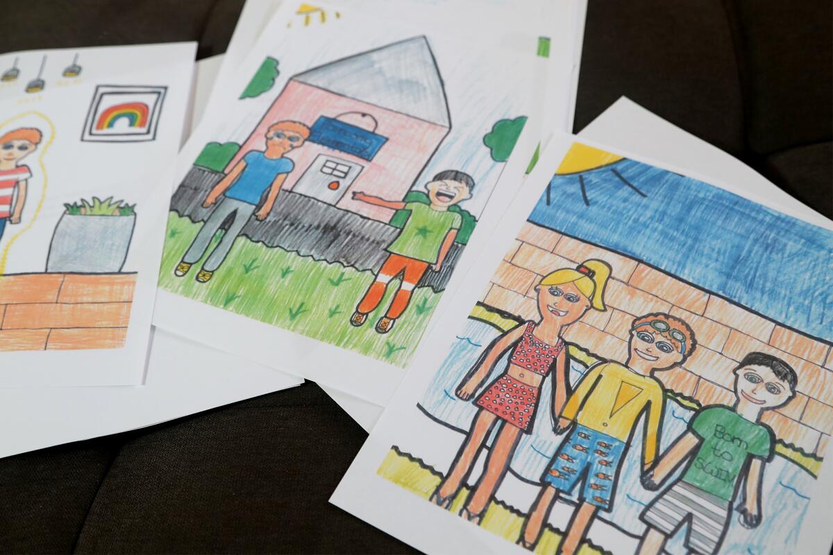 Pages showing artwork created by the Troutman children for their anti-bullying book.