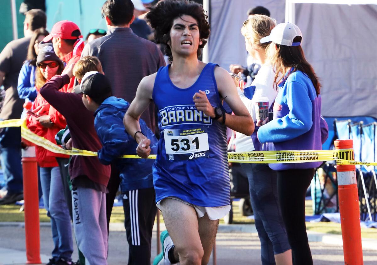 Fountain Valley's Diego Alonso (531) competes in the Division 1 boys' race of the CIF finals at Mt. SAC on Saturday.