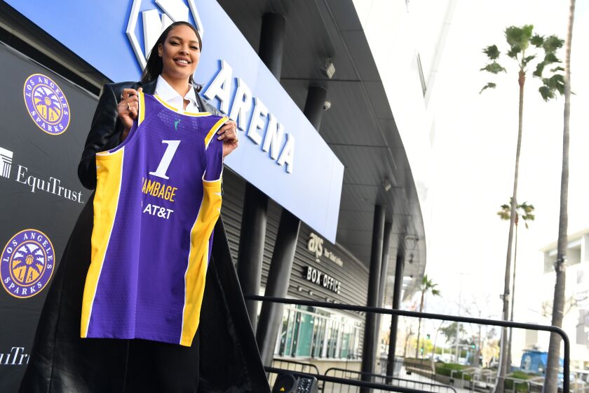 Los Angeles, California February 23 2022: New Sparks player Liz Cambage holds her jersey.