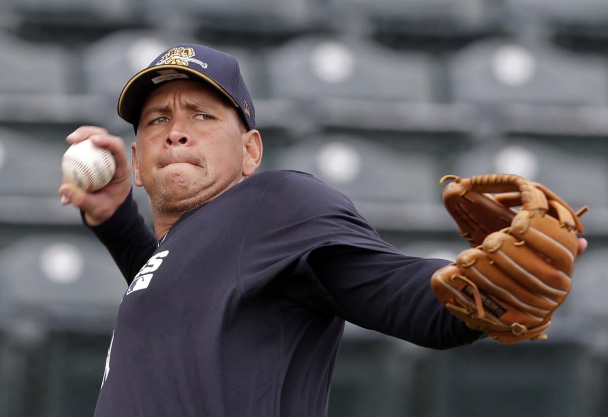 New York Yankees shortstop Alex Rodriguez warms up before playing in a rehab game with the Charleston RiverDogs on July 2. Rodriguez reportedly is part of Major League Baseball's investigation into players who received performance-enhancing drugs.