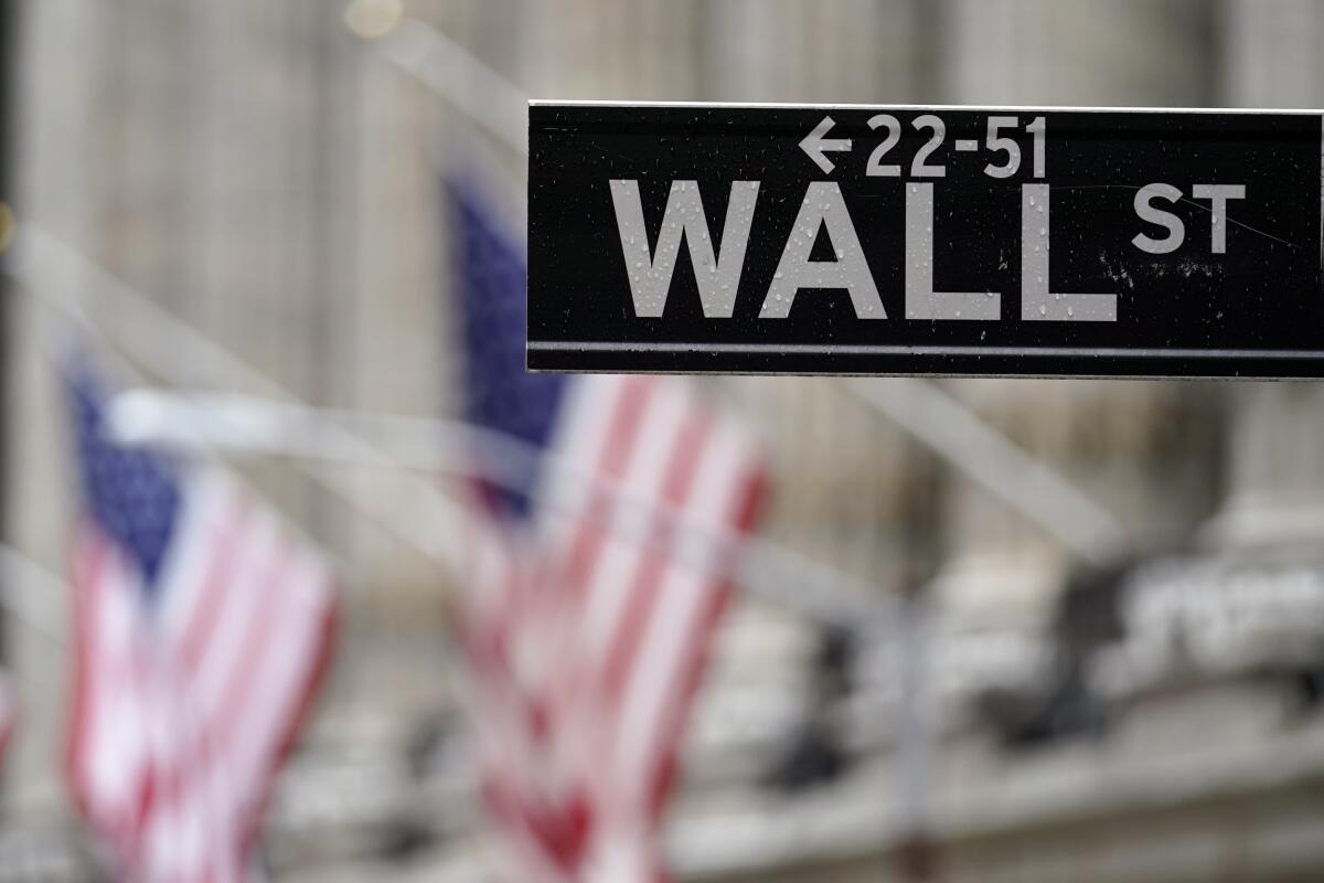 Wall Street sign outside the New York Stock Exchange