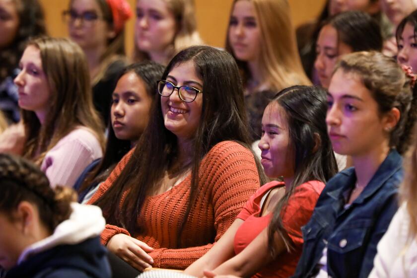 Howard Lipin  U-t San Diego Unified School District high school students listen as Karen Nelson, president of the J. Craig Venter Institute, speaks on Wednesday.