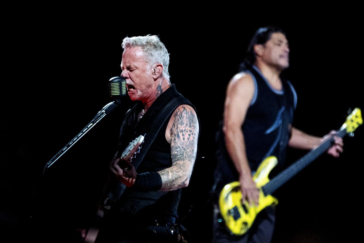 James Hetfield and Robert Trujillo of Metallica perform onstage