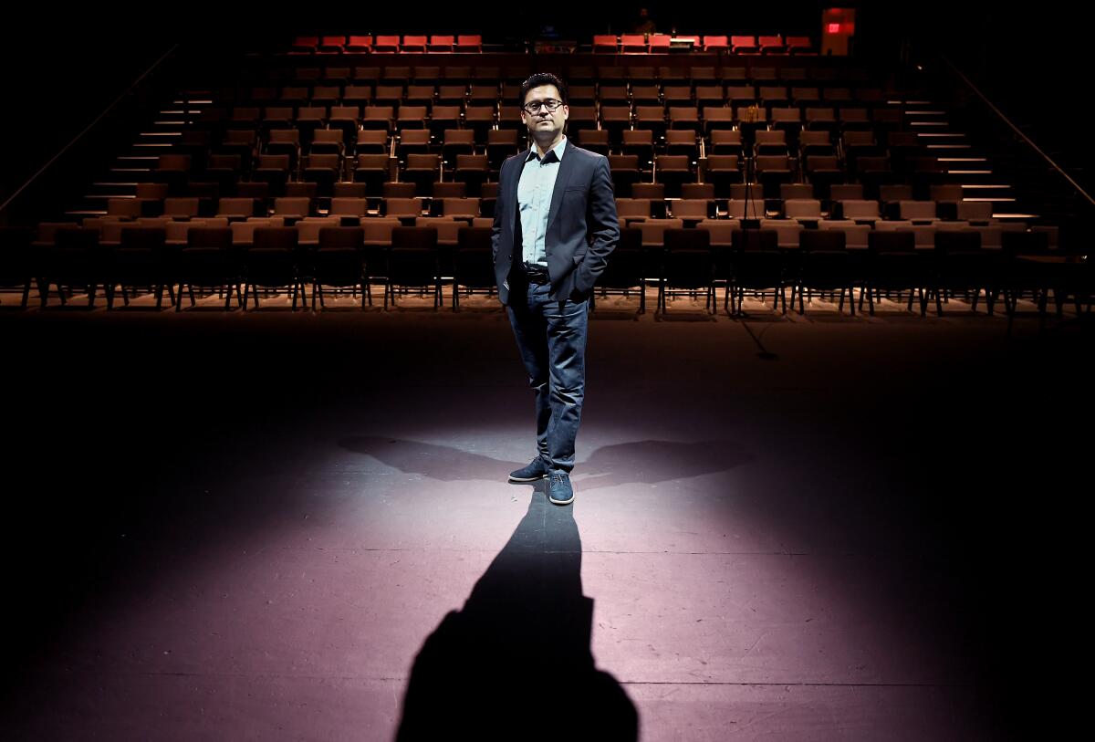 Edgar Miramontes, deputy executive director and curator at REDCAT, onstage in Los Angeles