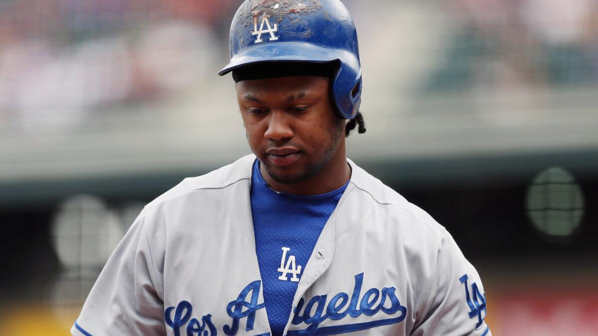 Dodgers shortstop Hanley Ramirez reacts after striking out against the Colorado Rockies on Saturday. Ramirez did not start Wednesday against the Cincinnati Reds because of irritation in his right shoulder.