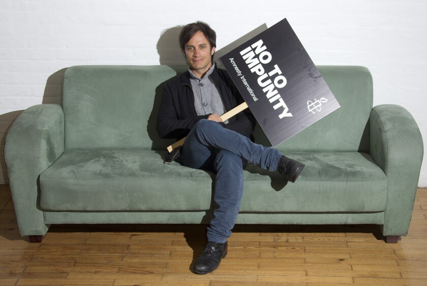 Gael Garcia Bernal poses for photos at the Amnesty International office in east London, to promote his Oscar-nominated film, NO, documenting the fall of Chilean dictator Agusto Pinochet.