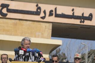 United Nations Secretary General Antonio Guterres speaks after his visit to the Rafah border crossing between Egypt and the Gaza Strip, Saturday, March 23, 2024. Arabic reads, "Rafah border crossing". (AP Photo/Amr Nabil)