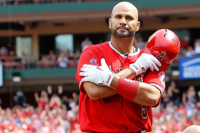 ST. LOUIS, MO - JUNE 22: Albert Pujols #5 of the Los Angeles Angels of Anaheim gives fans a curtain call after hitting a solo home run during the seventh inning against the St. Louis Cardinals at Busch Stadium on June 22, 2019 in St. Louis, Missouri. (Photo by Scott Kane/Getty Images) ** OUTS - ELSENT, FPG, CM - OUTS * NM, PH, VA if sourced by CT, LA or MoD **